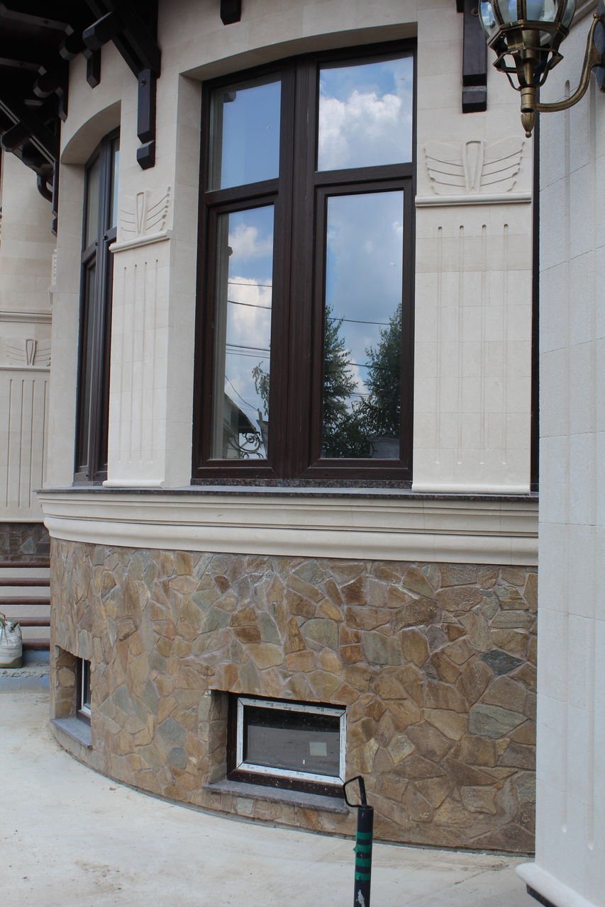 Отделка фасада природным камнем