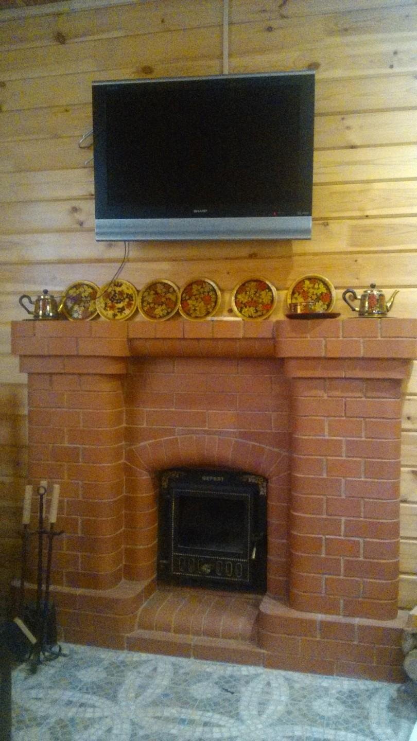 Отделка печи в бане в комнате отдыха