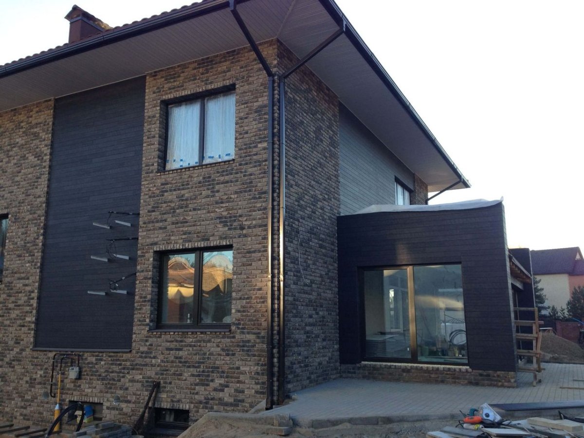 Фиброцементные фасадные панели под камень