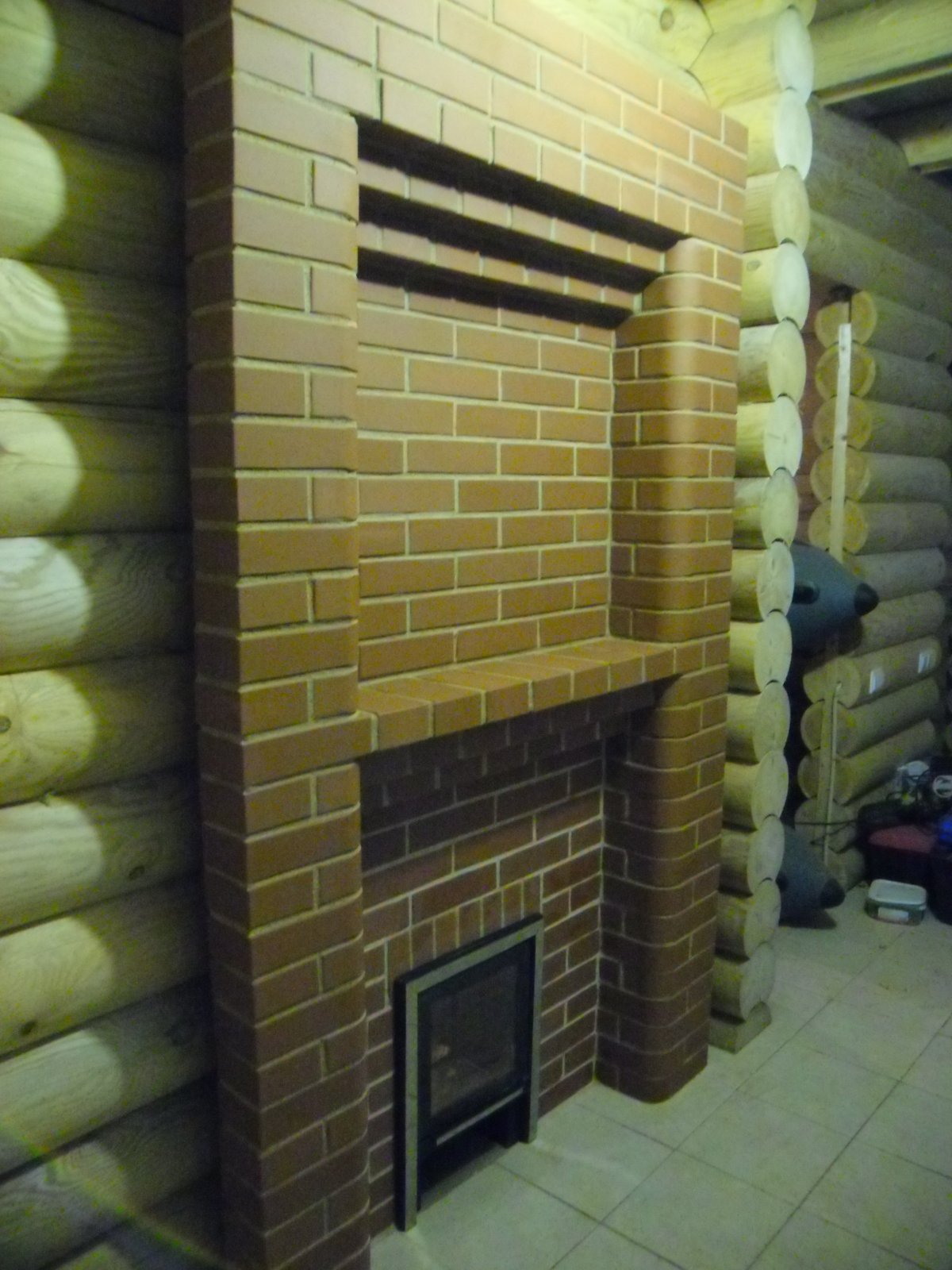 Гейзер 2014 обкладка кирпичом