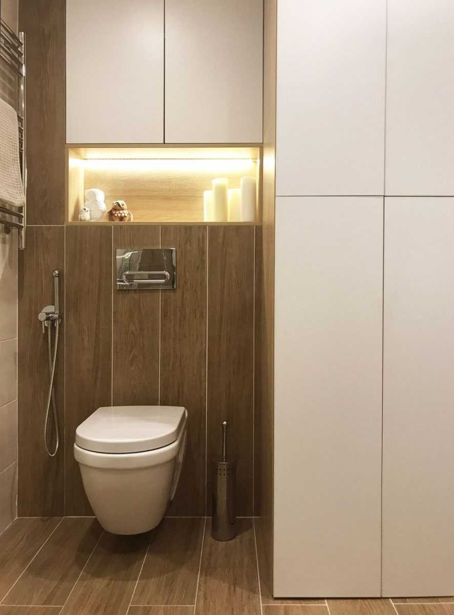 Встроенный шкаф над инсталляцией в туалете