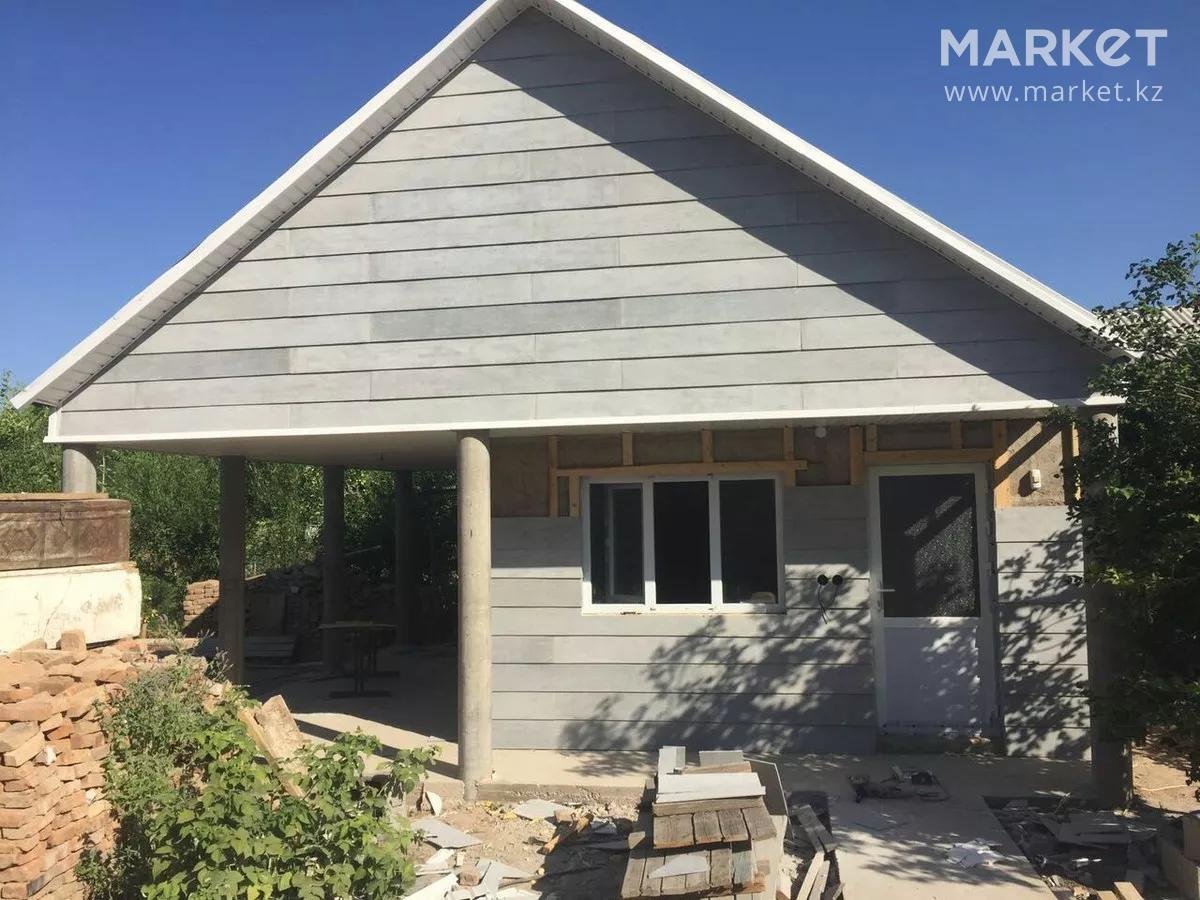 Отделка фасада плоским шифером