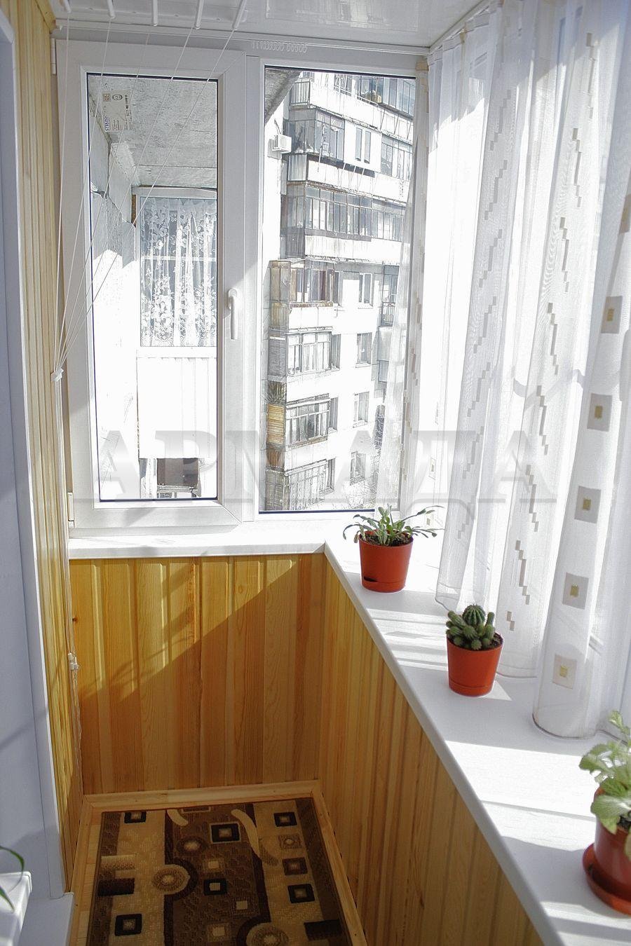 Отделка маленького балкона