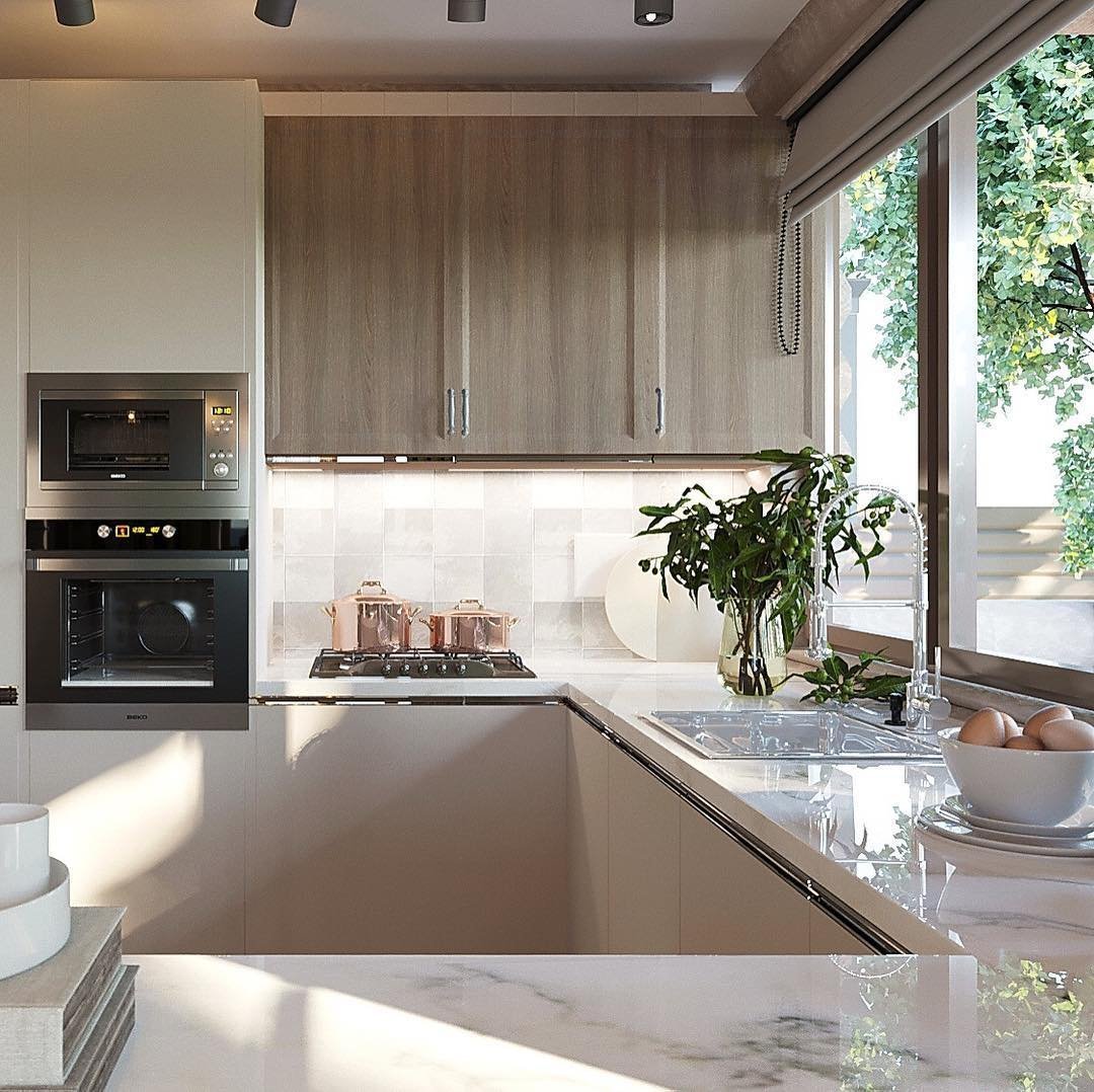 Раковина у окна на кухне