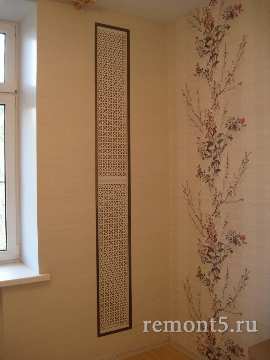 Декор трубы отопления в комнате