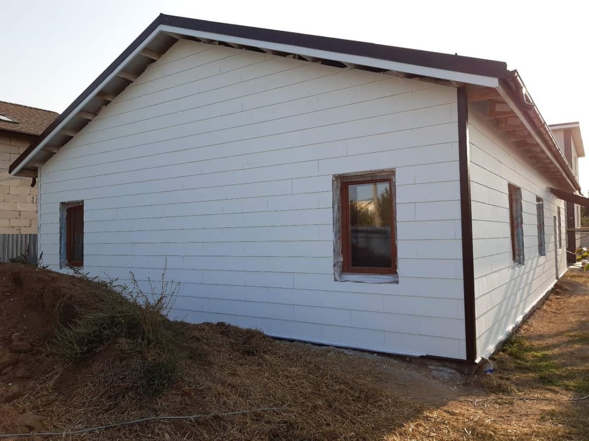 Отделка фасада плоским шифером