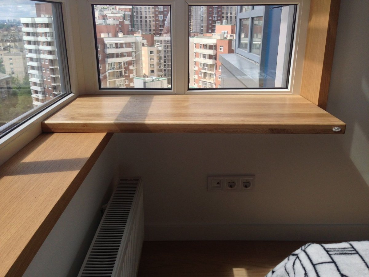 Широкий подоконник в интерьере