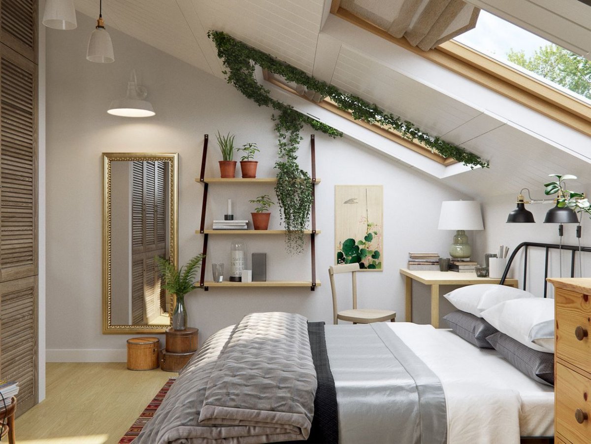 Интерьер мансарды с ломаной крышей