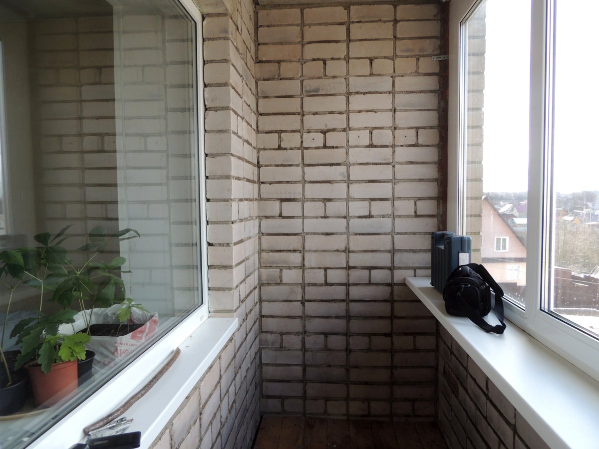 Отделка балкона камнем