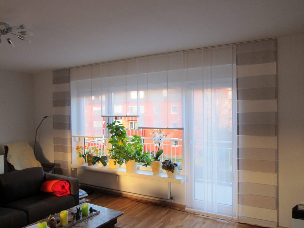 Тюль в спальню с балконной дверью