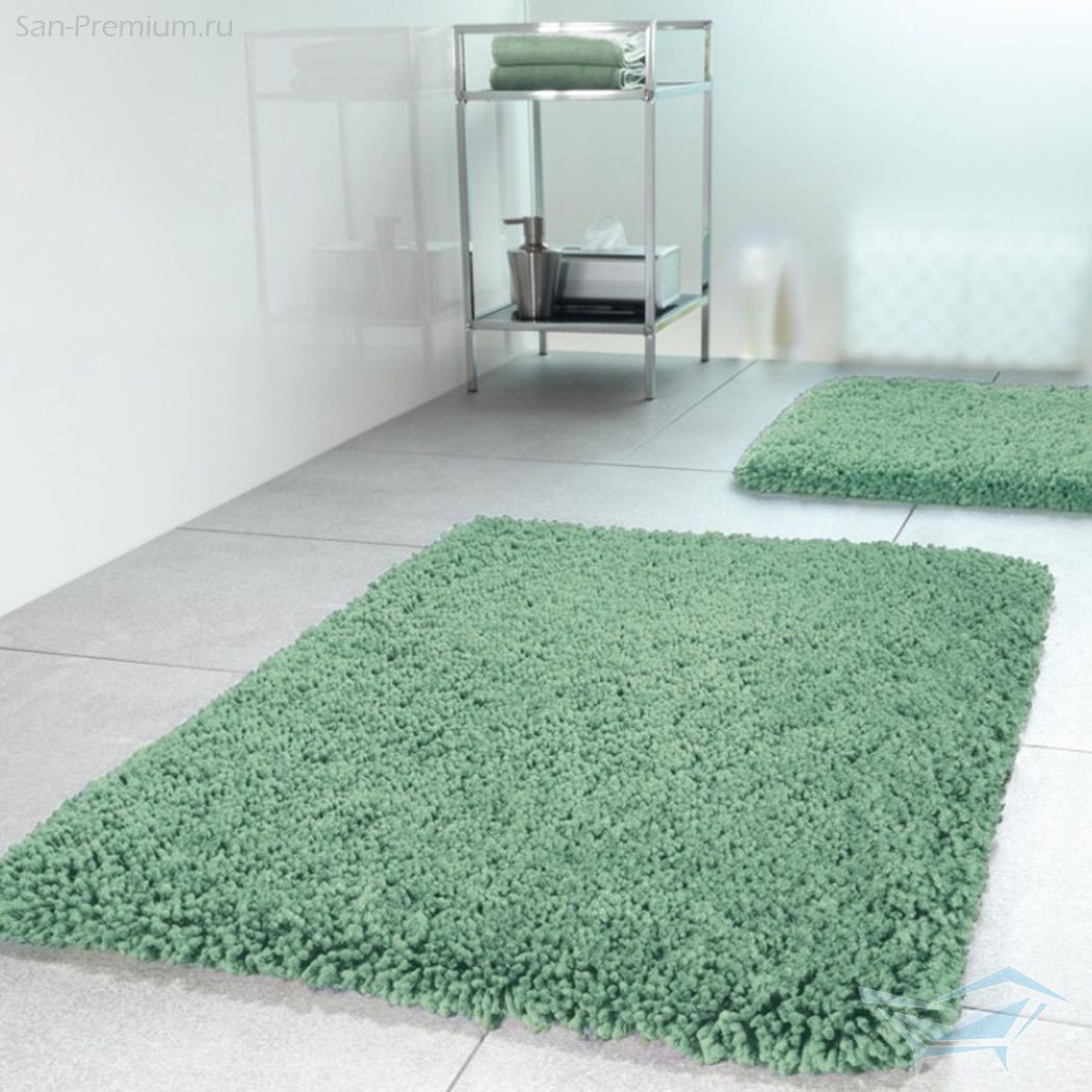 Зеленый коврик в ванную комнату