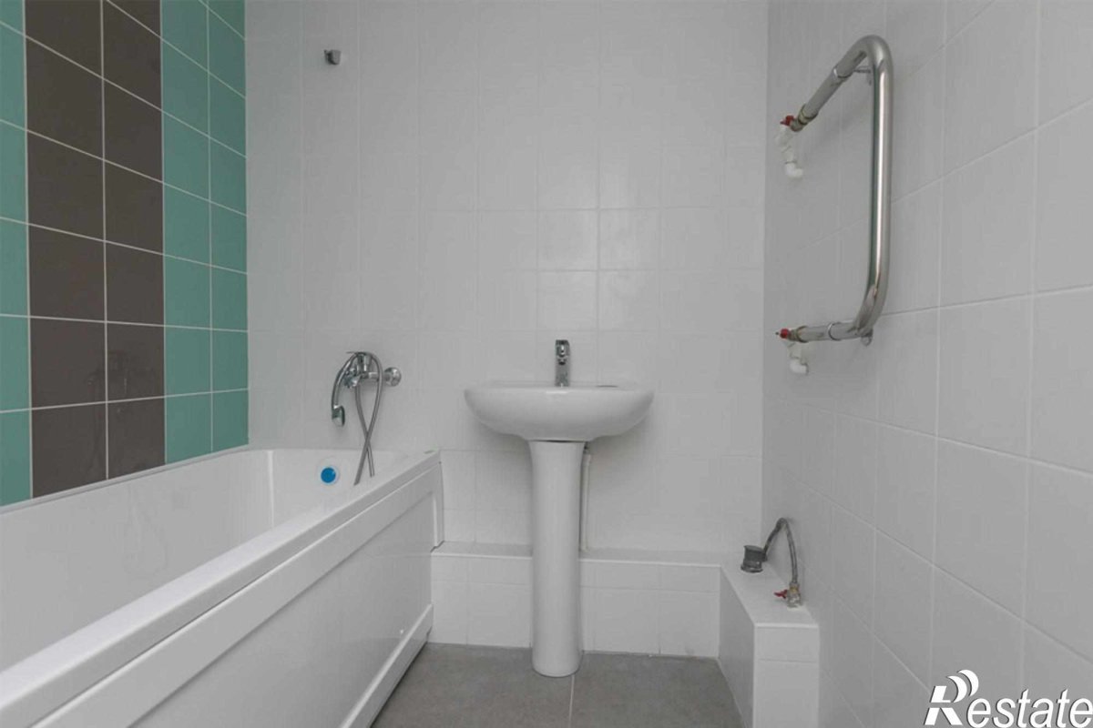 Ванная отделанная кафелем