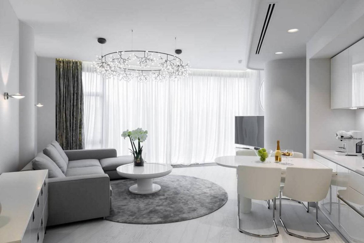 Гостиная с серыми стенами