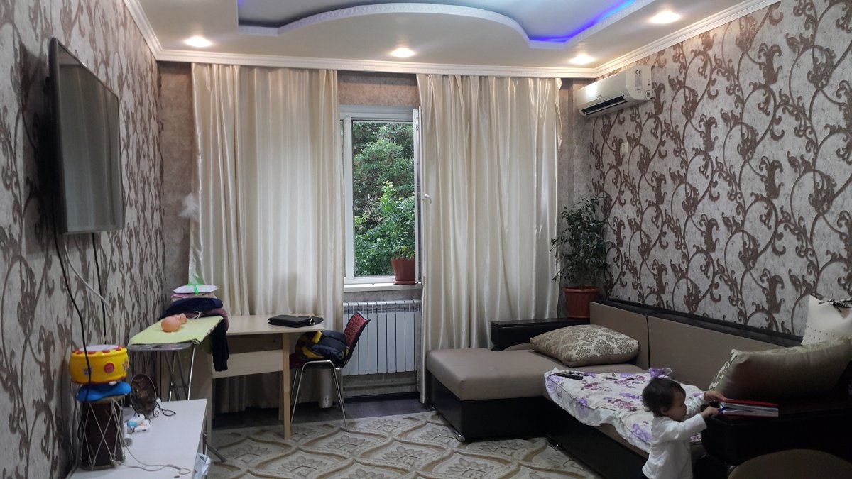 Окрашенные стены в интерьере гостиной