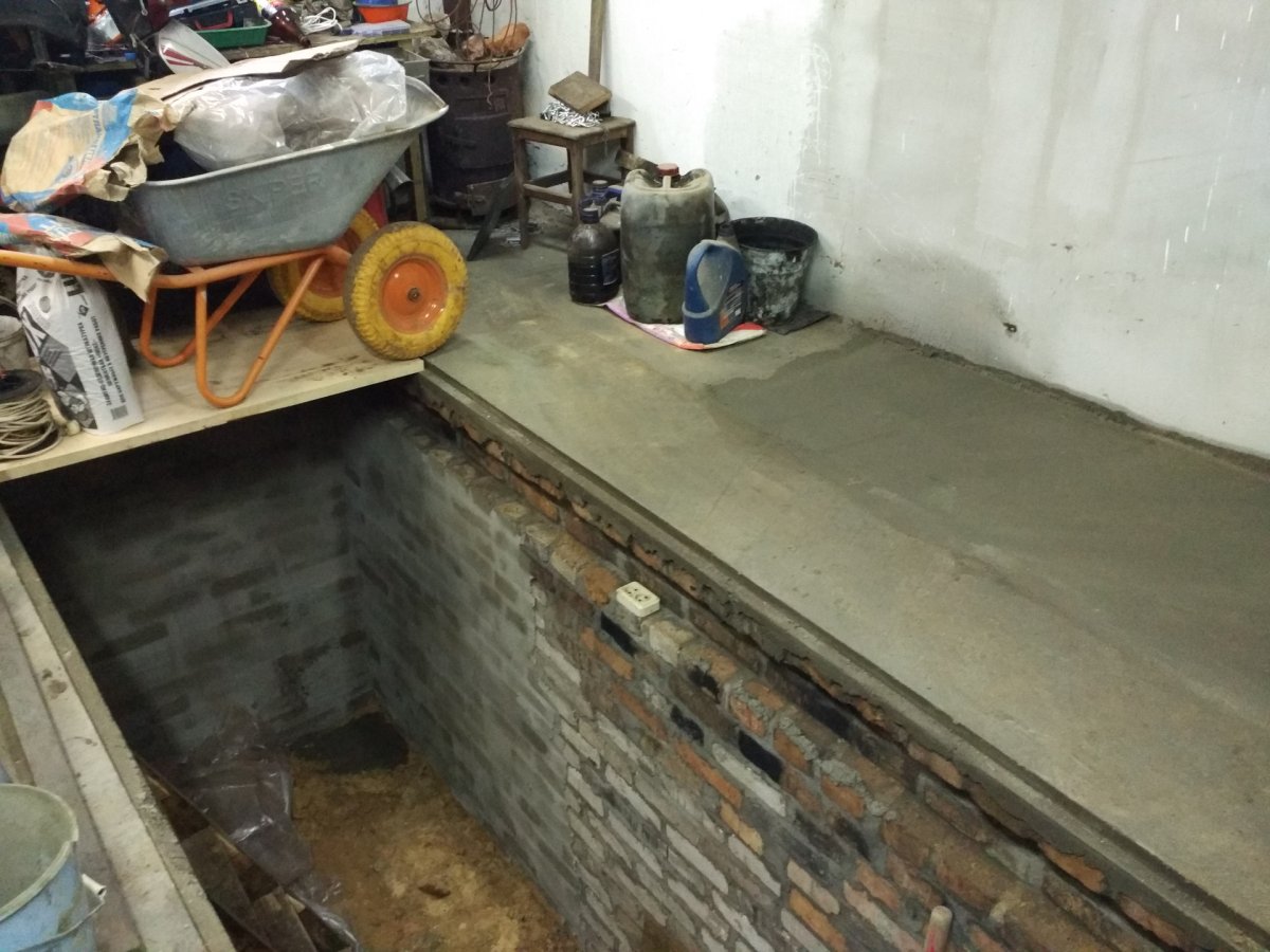 Отделка смотровой ямы в гараже