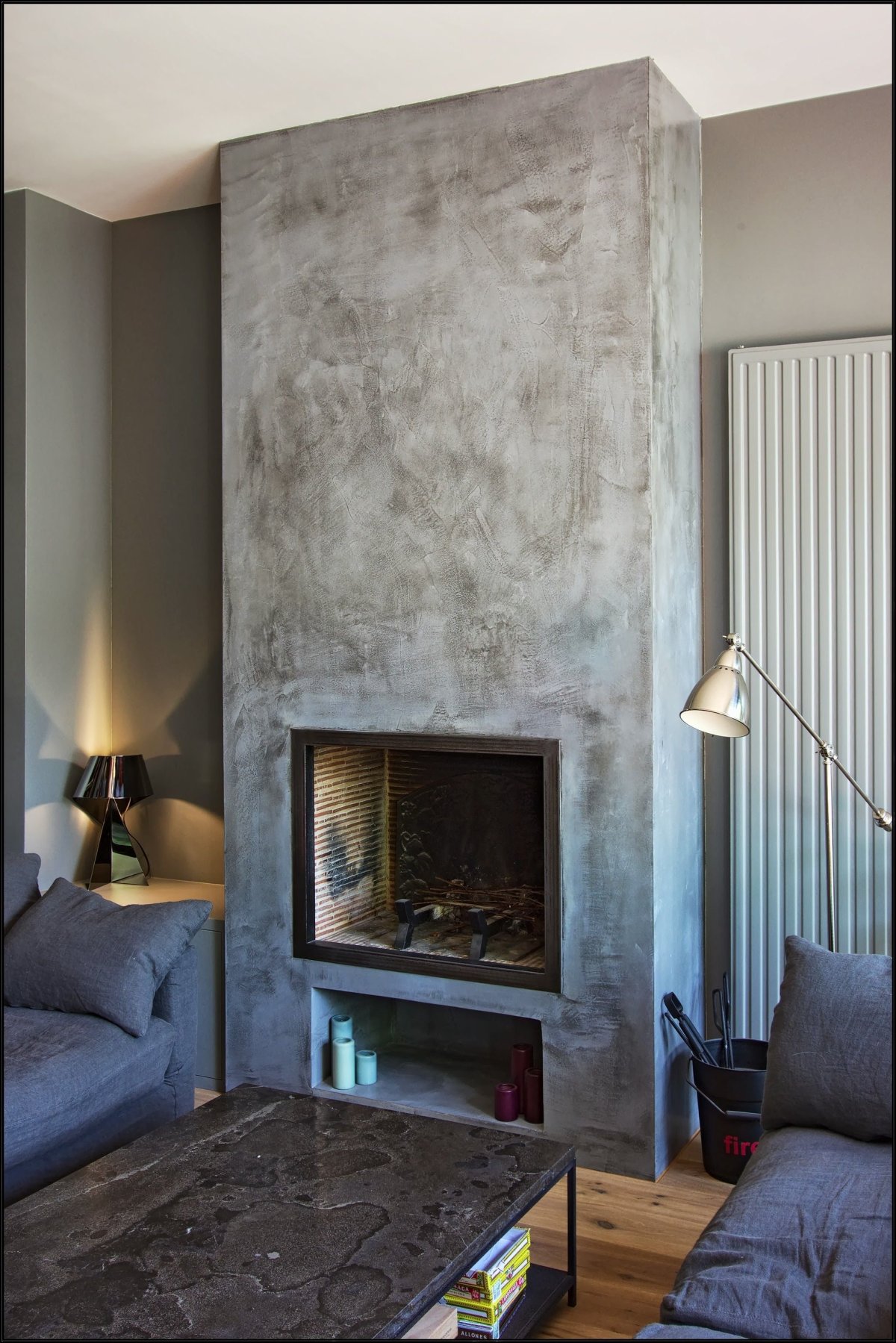 Отделка камина декоративной штукатуркой