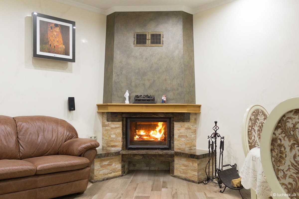 Угловой камин облицовка штукатурка