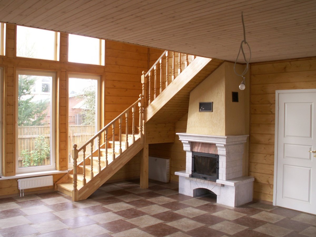 Печь камин под лестницей