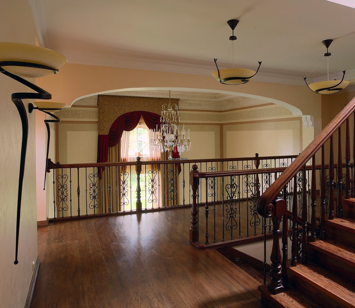 Винтовая лестница в интерьере гостиной