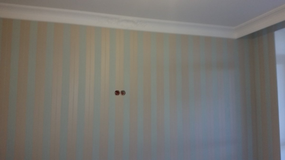 Отделка стен в квартире обоями