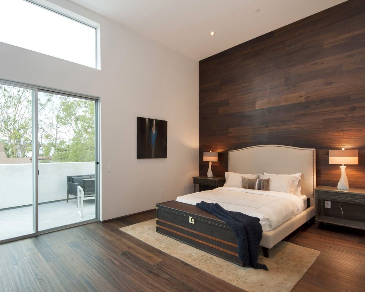 Спальня с ламинатом на стене в стиле лофт