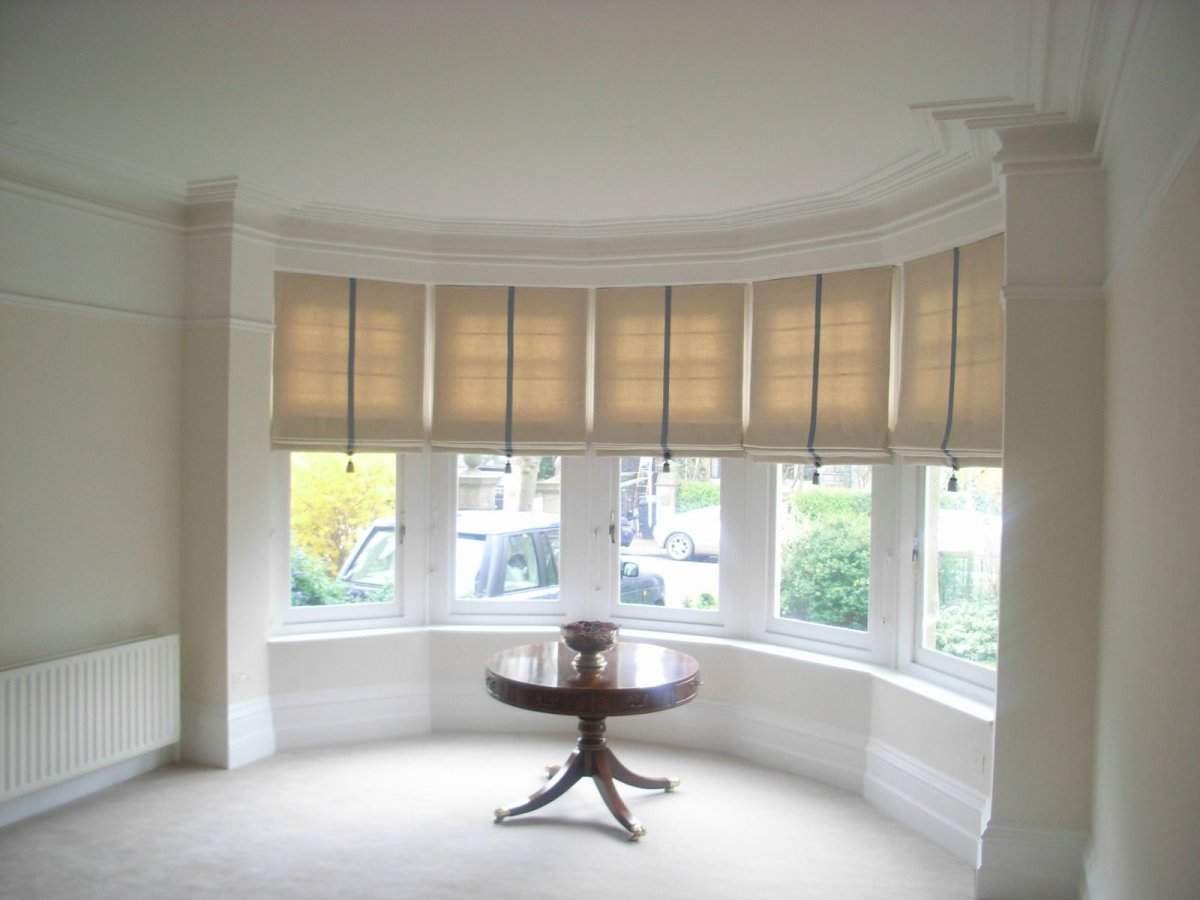Римские шторы на эркерные окна