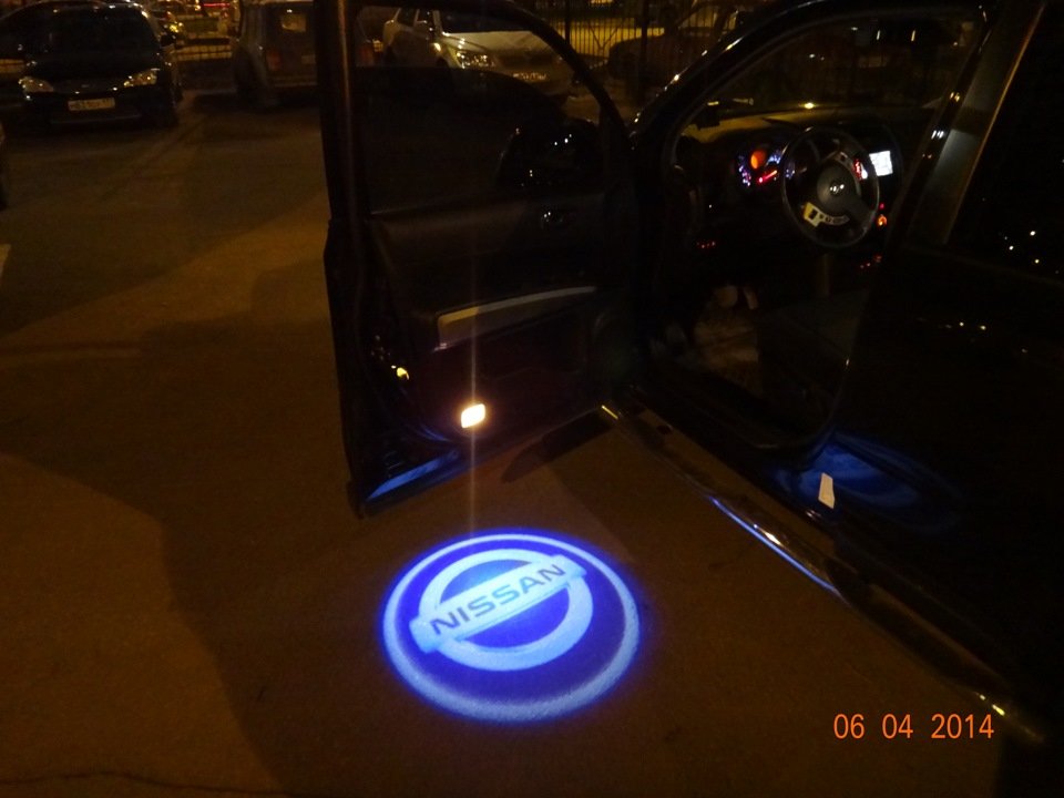 Подсветка логотипа купить. Подсветка дверей (Lifan - 7w). Nissan x Trail подсветка двери. Проектор фирменного знака Nissan (комп. -2 Шт). Ниссан х Трейл 2021 подсветка двери.