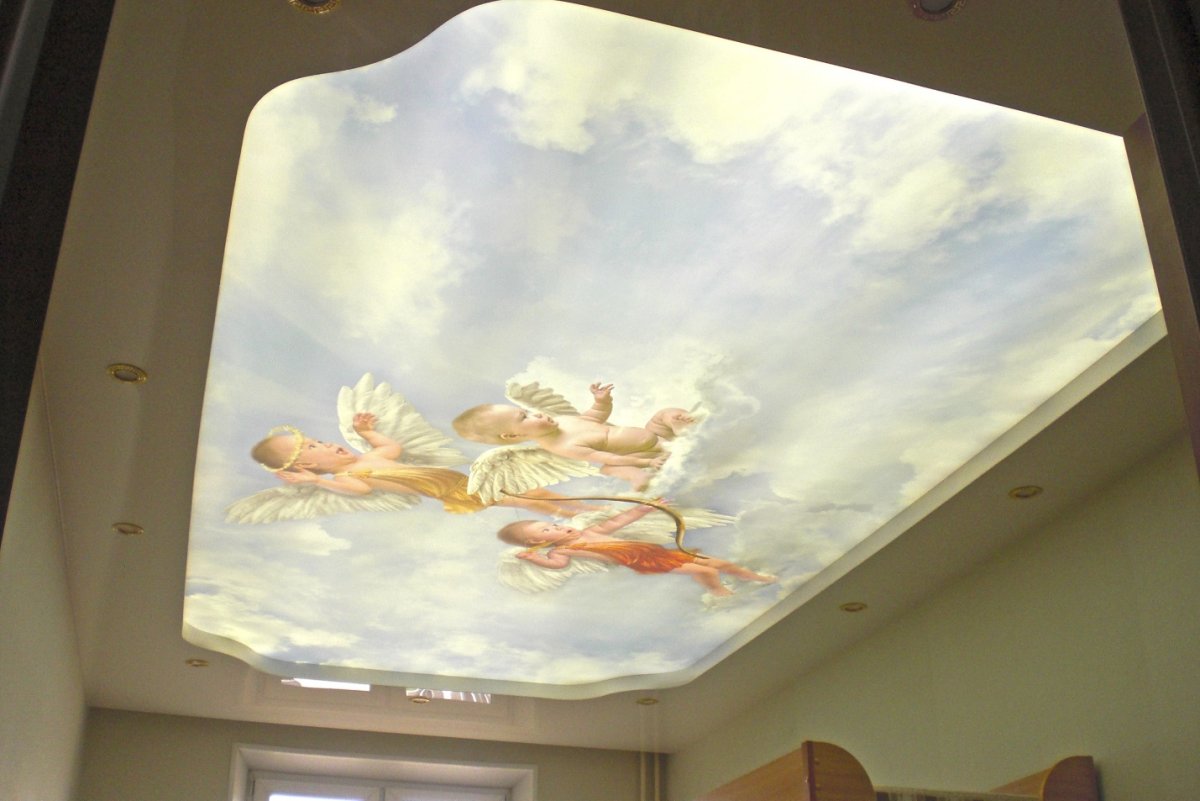 Натяжные потолки с ангелами