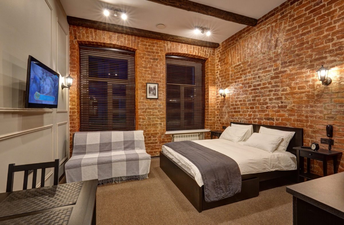 Фотообои в стиле лофт в интерьере гостиной