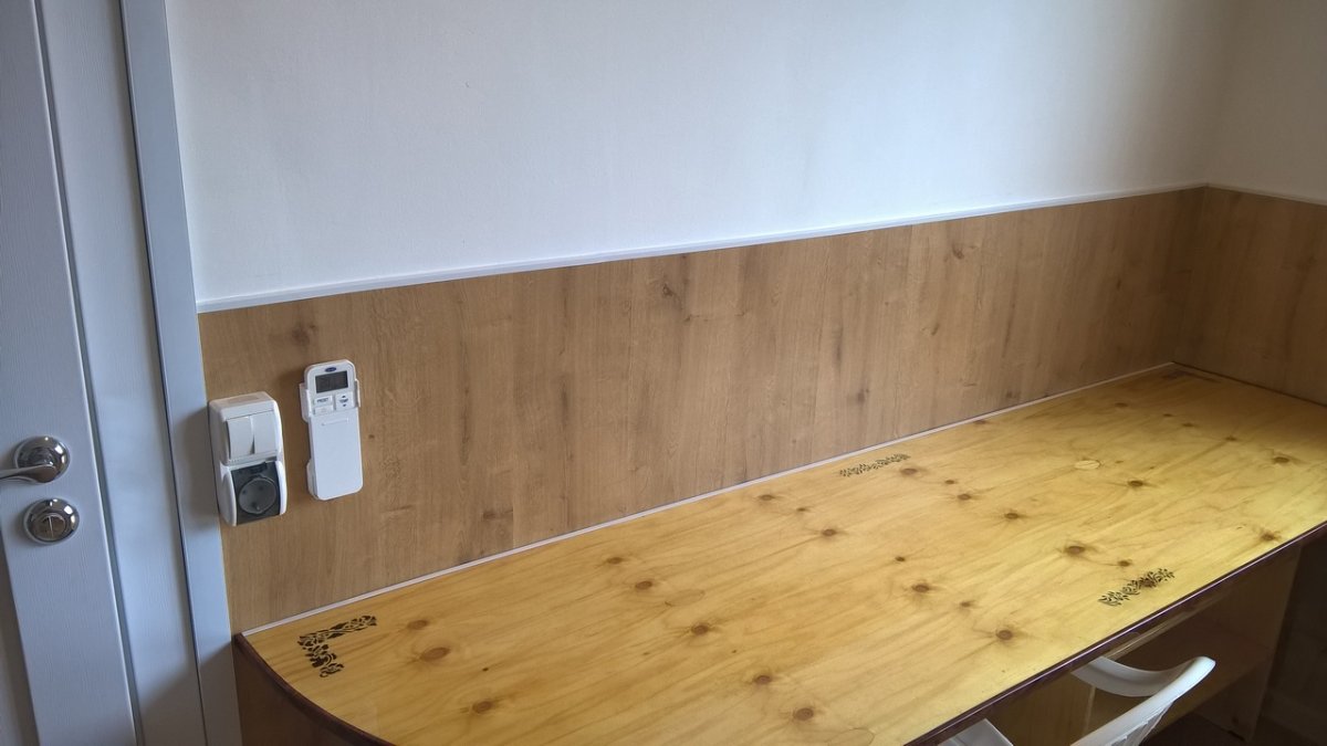 Декоративная отделка стен ламинатом