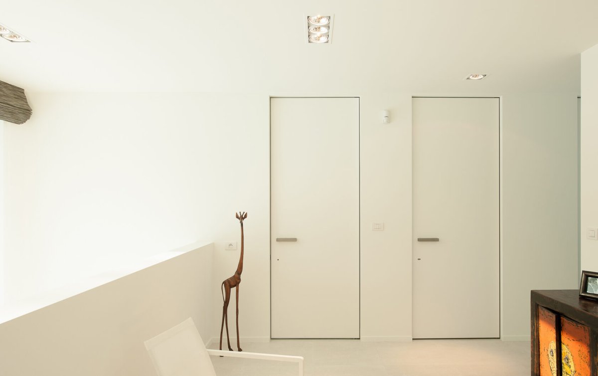 Скрытые двери в интерьере квартиры