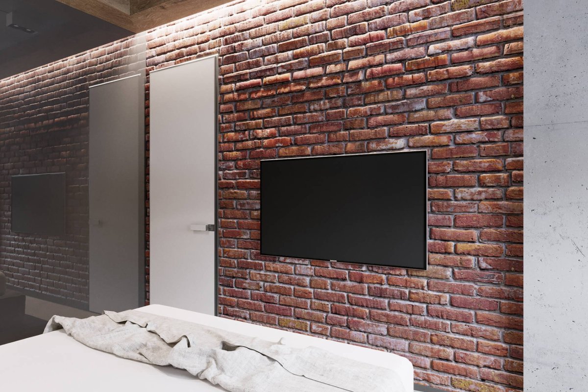 Телевизор на кирпичной стене