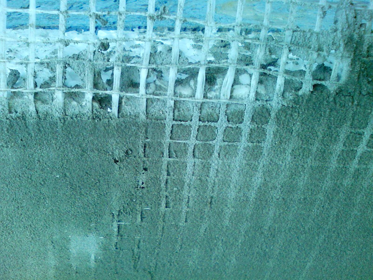 Нанесение фасадной штукатурки