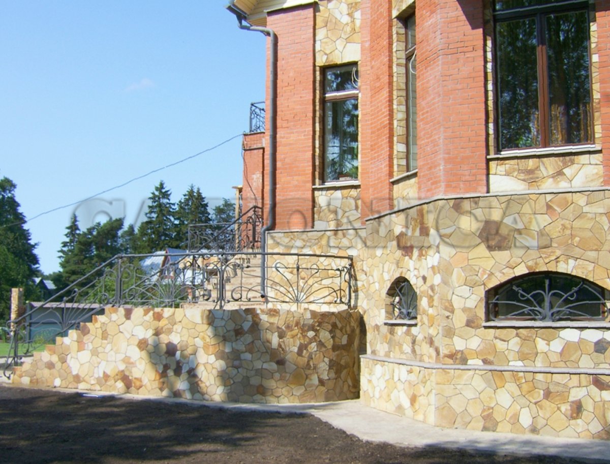 Отделка фасада искусственным камнем