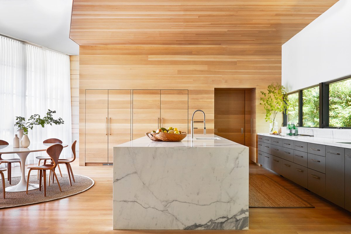 Ламинат на стене в интерьере кухни