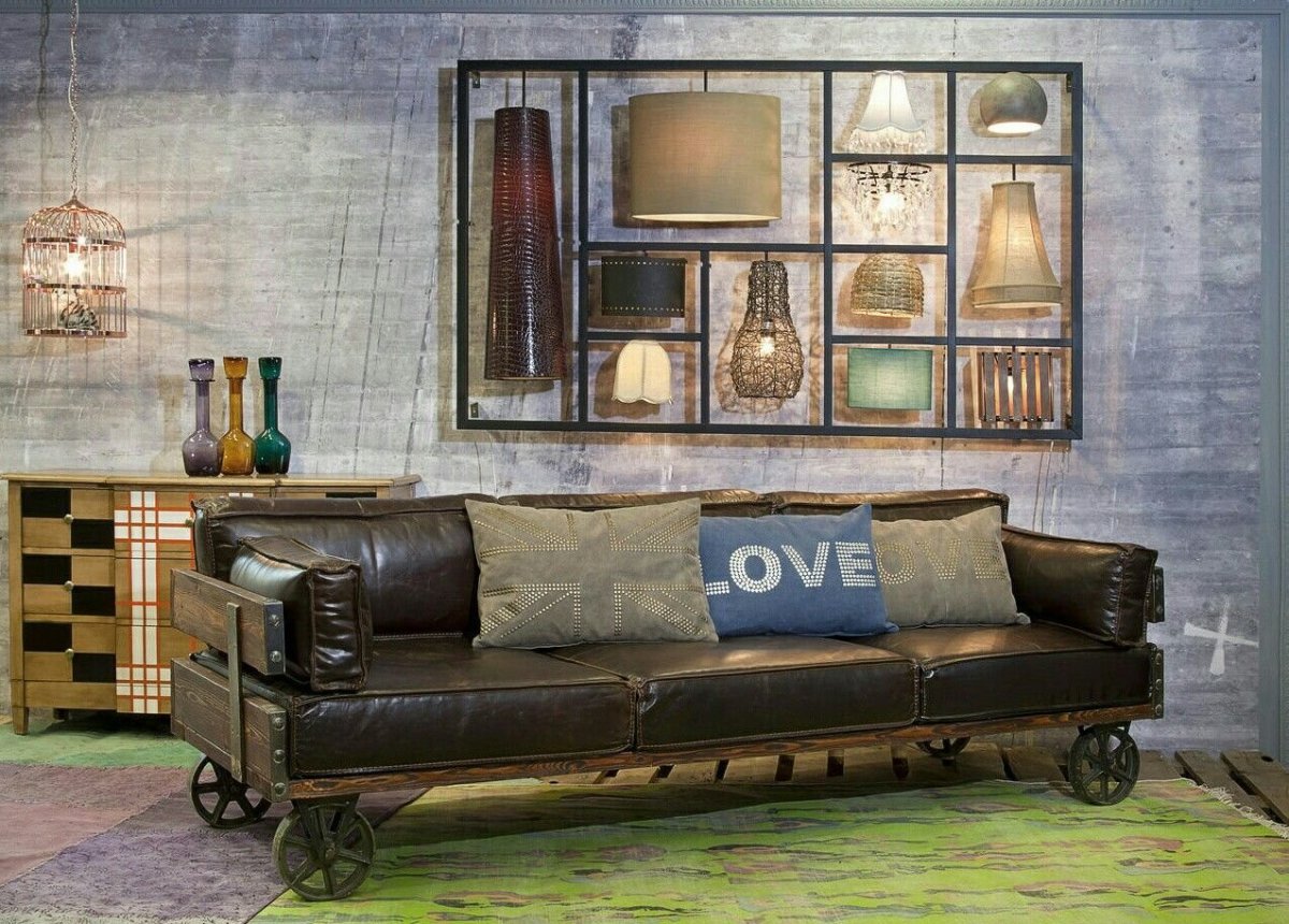 Кожаный диван в интерьере лофт