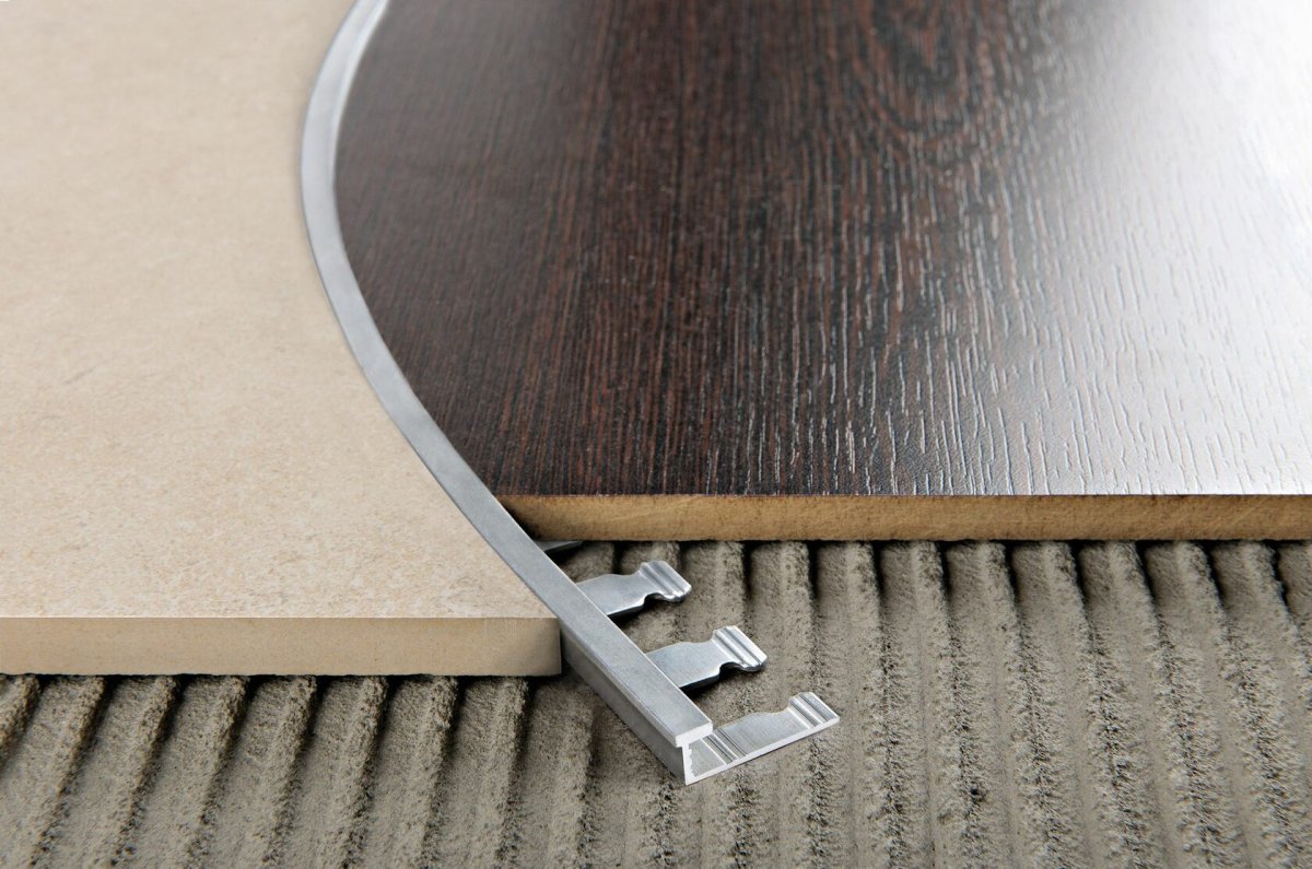 Порожек для соединения кварц винила и ламината