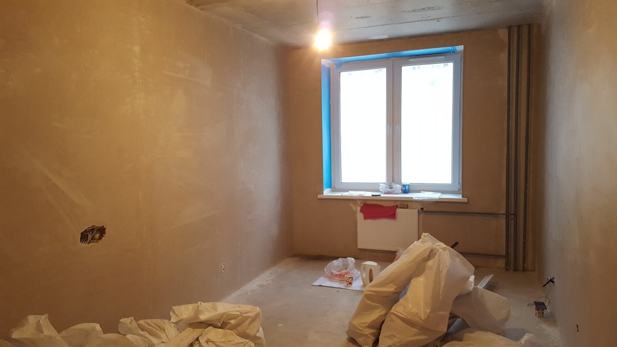 Штукатурка стен по маякам