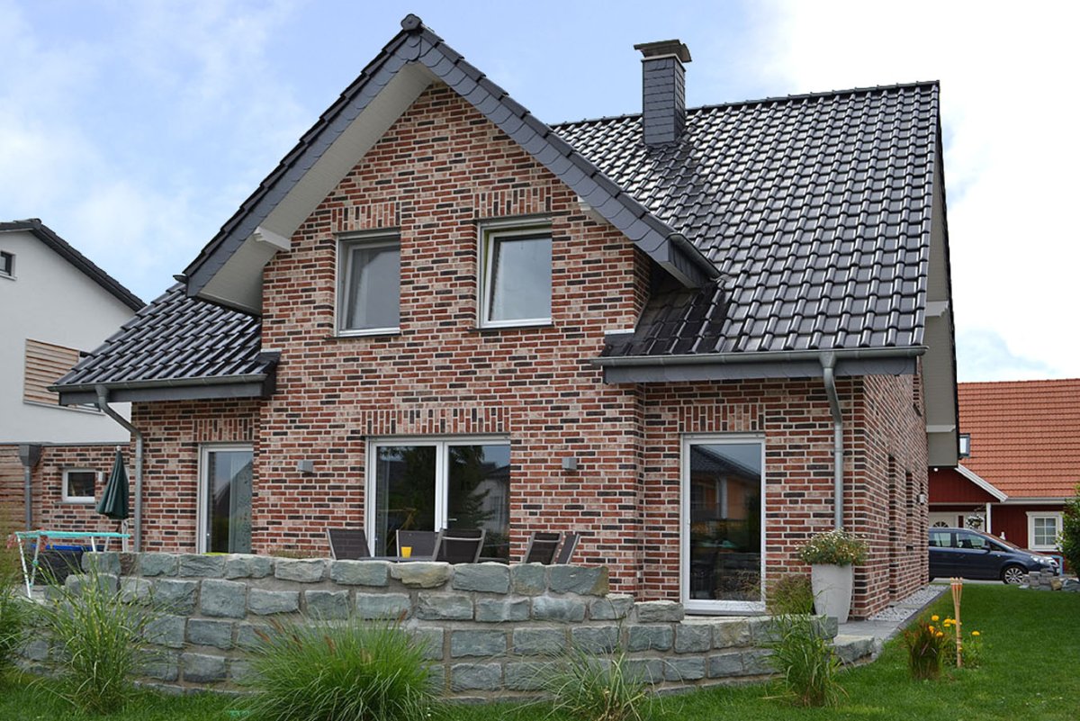 Фасады домов Отделанные плиткой