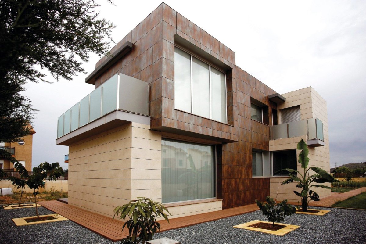 Отделка домов под камень