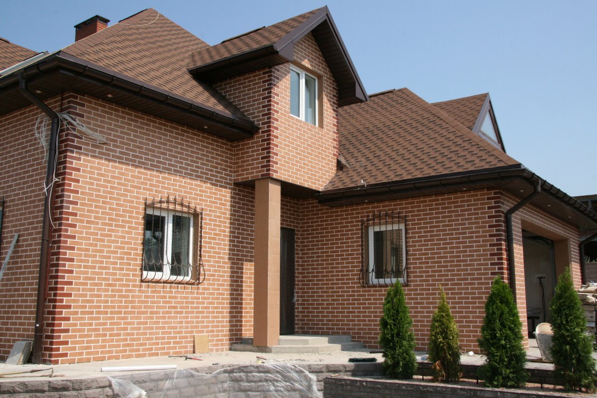 Фиброцементные фасадные панели под кирпич