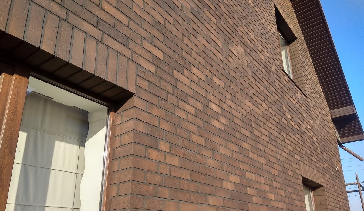 Отделка фасада каркасного дома гибким камнем