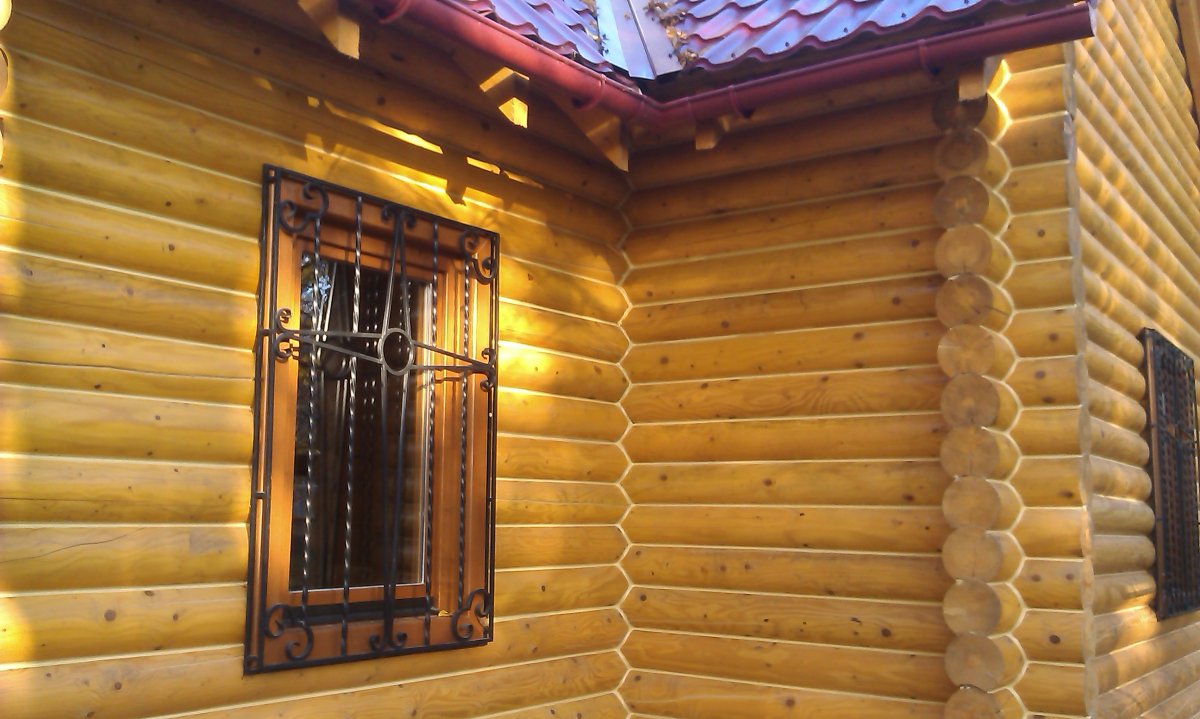 Отделка сруба веревкой