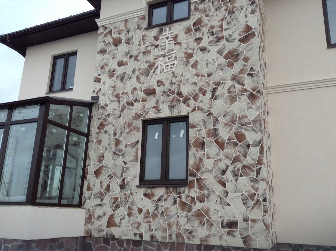Гибкий камень на фасаде дома