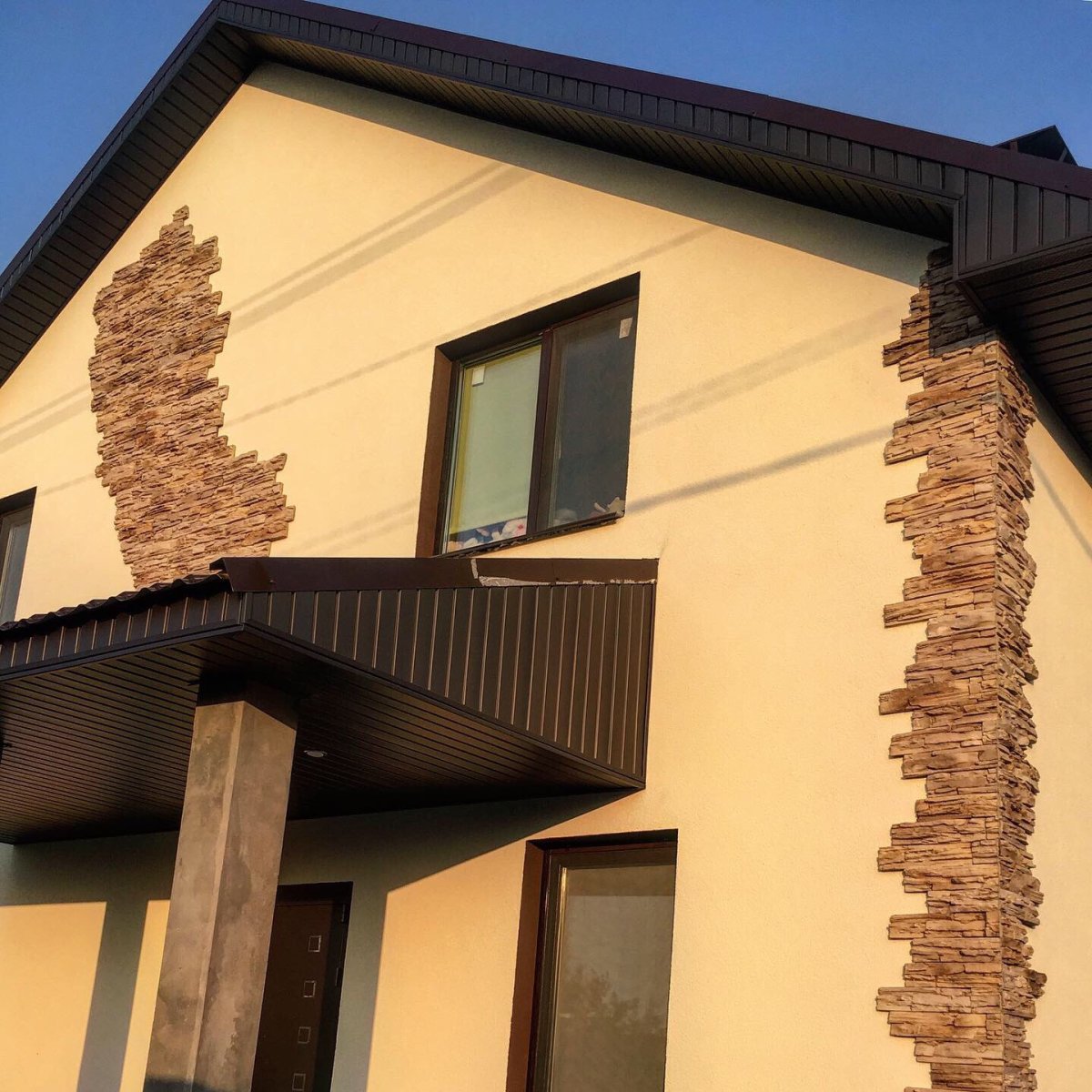 Дом с фасадной штукатуркой