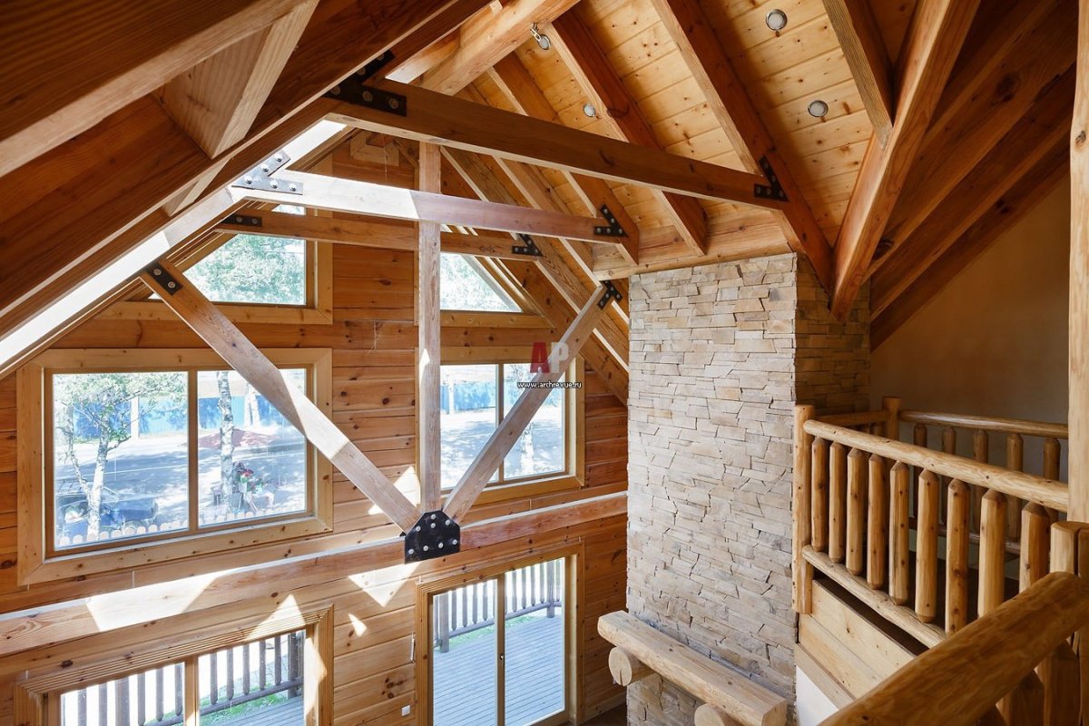 Интерьер мансардного этажа в частном доме