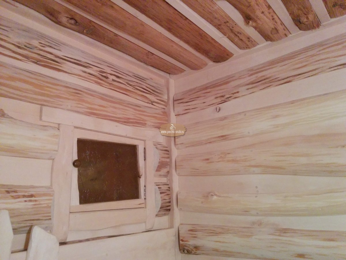 Интерьер бани из бревна