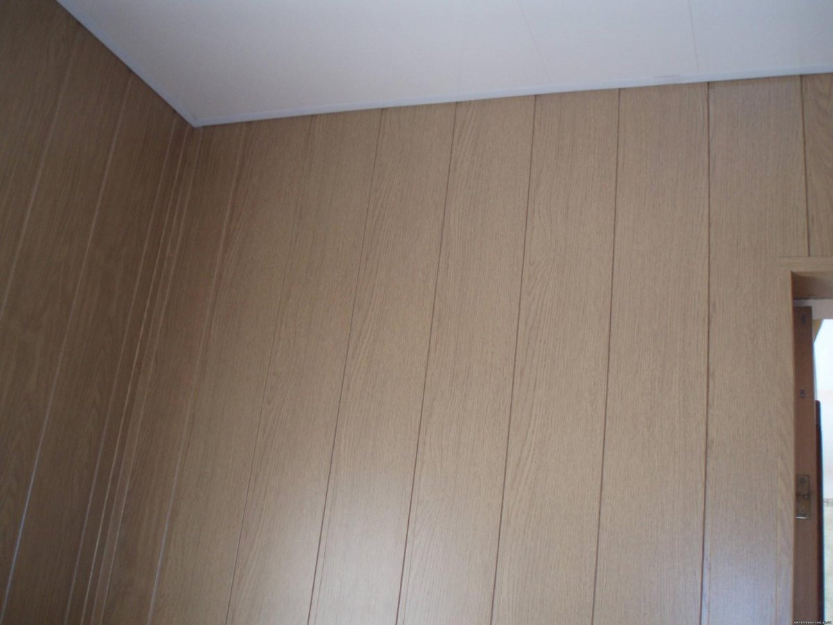 Отделка балкона панелями МДФ