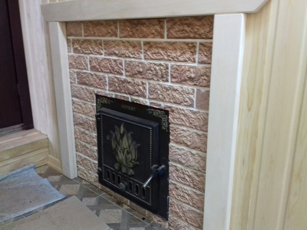 Облицовка камина искусственным камнем