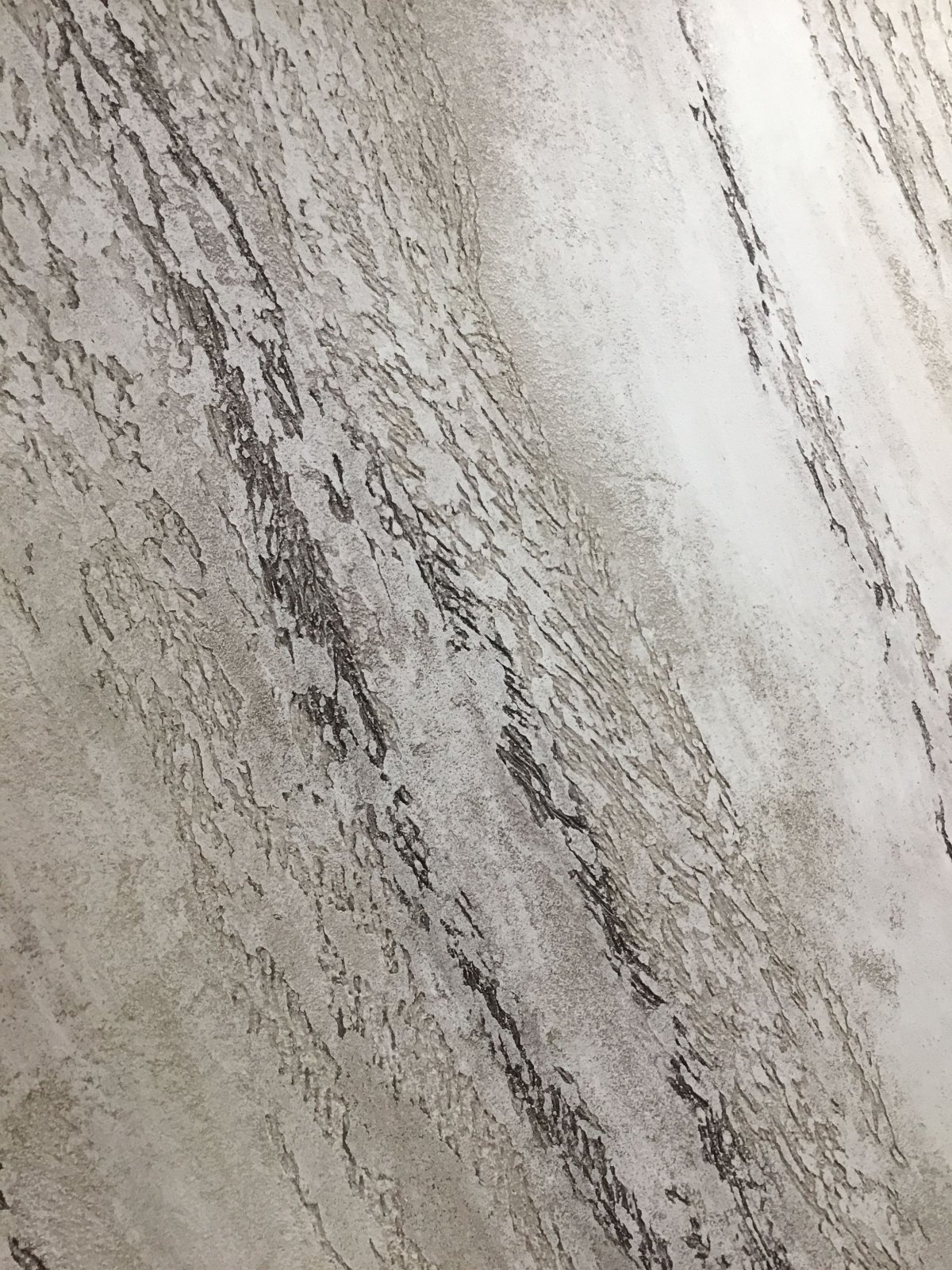 Штукатурка Travertino серая